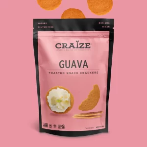 Craize Guava Toasted Snack Crackers bag on a pink background.